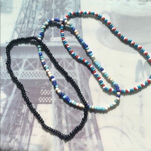 three handmade chokers